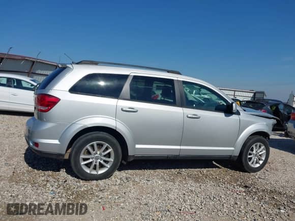2014 Dodge Journey SXT with VIN 3C4PDCBB3ET112742, listed as a IAAI auction lot 43420445 with 113,538 mi miles and . Bid and sale history available at DreamBid. Image 14.