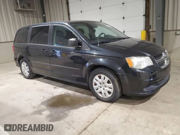 2014 Dodge Grand Caravan American Value with VIN 2C4RDGBG7ER478377, listed as a Copart auction lot 82412495 with 100,330 mi miles and Clean title. Bid and sale history available at DreamBid. Image 4.