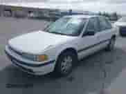 1990 Honda Accord LX with VIN JHMCB7652LC067333, listed as a IAAI auction lot 42580921 with 119,733 mi miles and . Bid and sale history available at DreamBid. Image 6.