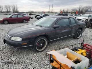1999 Chevrolet Monte Carlo LS z VIN 2G1WW12M3X9280133, wystawiony jako Copart lot #81814554 z przebiegiem 81 630 mil mil oraz Szkoda całkowita • Salvage title. Historia ofert i sprzedaży dostępna na DreamBid. Obrazek 1.