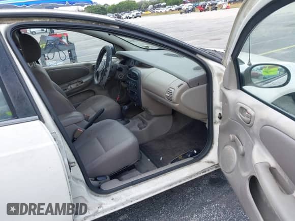 2004 Dodge Neon SE z VIN 1B3ES26C04D594389, wystawiony jako IAAI lot #41457297 z przebiegiem 143 592 mil mil oraz . Historia ofert i sprzedaży dostępna na DreamBid. Obrazek 5.