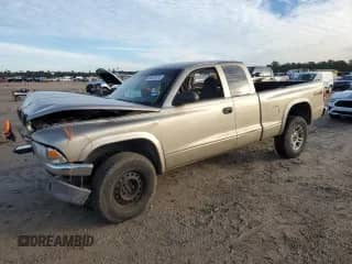 2003 Dodge Dakota SLT z VIN 1D7HG42N43S198823, wystawiony jako Copart lot #88120315 z przebiegiem Nie podano mil oraz Szkoda całkowita • Salvage title. Historia ofert i sprzedaży dostępna na DreamBid. Obrazek 1.