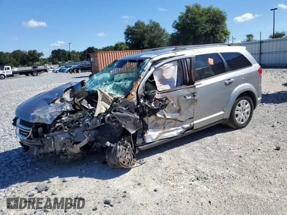 2016 Dodge Journey SE with VIN 3C4PDCAB9GT239323, listed as a Copart auction lot 83819495 with Not provided miles and Non repairable. Bid and sale history available at DreamBid. Image 1.