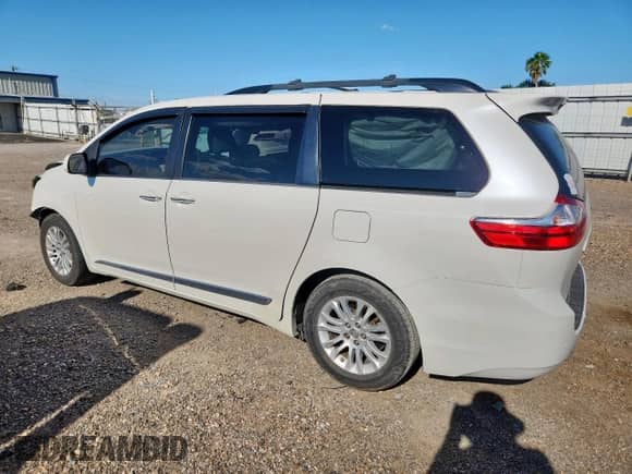 2016 Toyota Sienna XLE with VIN 5TDYK3DC5GS742176, listed as a Copart auction lot 81008715 with 156,068 mi miles and Salvage title. Bid and sale history available at DreamBid. Image 2.