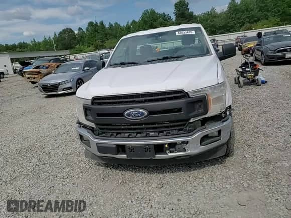 2019 Ford F-150 XL with VIN 1FTNF1C40KKD89058, listed as a Copart auction lot 63053485 with 233,103 mi miles and Salvage title. Bid and sale history available at DreamBid. Image 13.