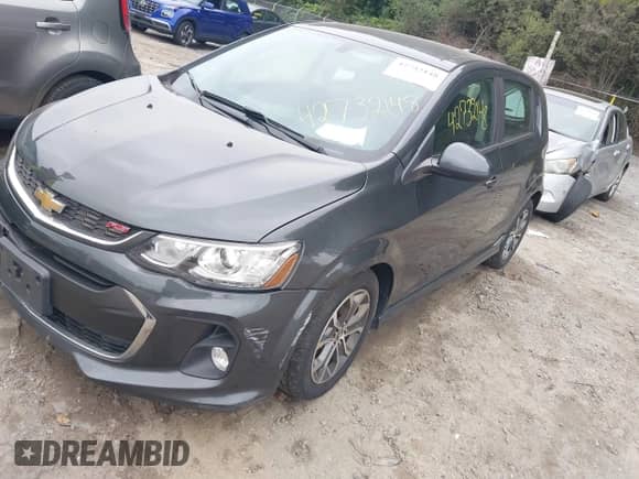 2017 Chevrolet Sonic LT z VIN 1G1JD6SH9H4144741, wystawiony jako IAAI lot #42732148 z przebiegiem 142 736 mil mil oraz . Historia ofert i sprzedaży dostępna na DreamBid. Obrazek 2.