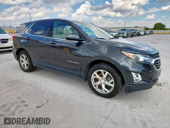 2018 Chevrolet Equinox LT с VIN 2GNAXKEX2J6169017, выставлен на аукционе Copart как лот 71102855 с пробегом 115 202 миль миль и Списание • Salvage title. История ставок и продаж доступна на DreamBid. Изображение 4.