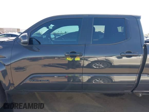 2024 Toyota Tacoma SR5 with VIN 3TMLB5FN8RM005075, listed as a IAAI auction lot 43290415 with 20,318 mi miles and . Bid and sale history available at DreamBid. Image 14.