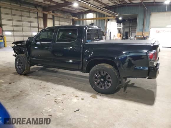 2021 Toyota Tacoma Limited with VIN 3TMGZ5ANXMM430133, listed as a Copart auction lot 57884415 with 36,650 mi miles and Salvage title. Bid and sale history available at DreamBid. Image 2.