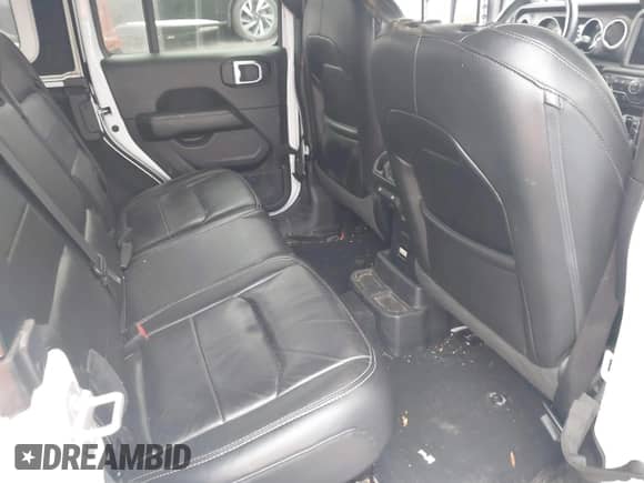 2023 Jeep Wrangler Sahara Altitude with VIN 1C4HJXEG9PW502267, listed as a IAAI auction lot 43266621 with 85,629 mi miles and . Bid and sale history available at DreamBid. Image 8.