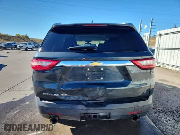 2018 Chevrolet Traverse LT Cloth с VIN 1GNEVGKW6JJ205892, выставлен на аукционе Copart как лот 86280475 с пробегом 99 765 миль миль и Списание • Salvage title. История ставок и продаж доступна на DreamBid. Изображение 6.