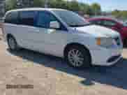 2014 Dodge Grand Caravan SXT with VIN 2C4RDGCG4ER356980, listed as a IAAI auction lot 43422340 with 220,103 mi miles and . Bid and sale history available at DreamBid. Image 1.