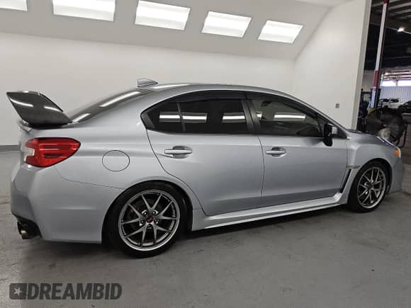2016 Subaru WRX Premium with VIN JF1VA1E66G9822027, listed as a Copart auction lot 81164335 with 147,008 mi miles and Clean title. Bid and sale history available at DreamBid. Image 3.