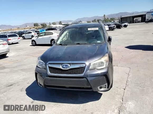 2014 Subaru Forester XT Touring z VIN JF2SJGPC5EH540243, wystawiony jako Copart lot #71917245 z przebiegiem 128 623 mil mil oraz Szkoda całkowita • Salvage title. Historia ofert i sprzedaży dostępna na DreamBid. Obrazek 14.