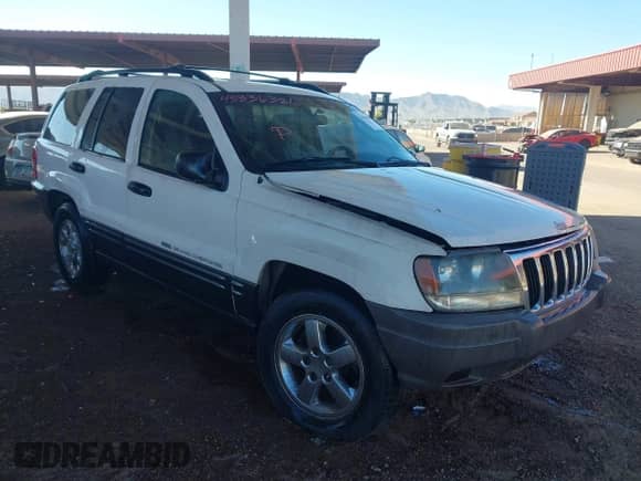 2004 Jeep Grand Cherokee Laredo with VIN 1J4GW48SX4C307555, listed as a IAAI auction lot 43336386 with 237,752 mi miles and . Bid and sale history available at DreamBid. Image 1.