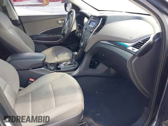 2015 Hyundai Santa Fe с VIN 5XYZTDLB0FG284526, выставлен на аукционе IAAI как лот 42697589 с пробегом 130 883 миль миль и . История ставок и продаж доступна на DreamBid. Изображение 5.