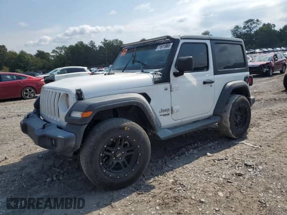2020 Jeep Wrangler Sport S with VIN 1C4GJXAG5LW302823, listed as a Copart auction lot 71611065 with 67,430 mi miles and Salvage title. Bid and sale history available at DreamBid. Image 1.