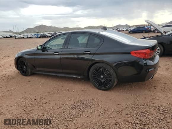 2018 BMW 5 Series 540i with VIN WBAJE5C53JWA94383, listed as a Copart auction lot 80821955 with 58,895 mi miles and Salvage title. Bid and sale history available at DreamBid. Image 2.