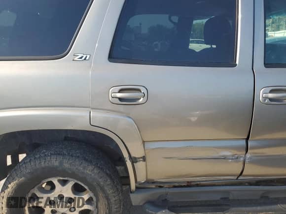 2003 Chevrolet Tahoe LT с VIN 1GNEK13Z33R113240, выставлен на аукционе Copart как лот 69320084 с пробегом 257 199 миль миль и Списание • Salvage title. История ставок и продаж доступна на DreamBid. Изображение 11.