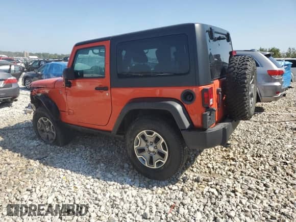 2015 Jeep Wrangler Rubicon with VIN 1C4BJWCG1FL702255, listed as a Copart auction lot 71294304 with 106,574 mi miles and Clean title. Bid and sale history available at DreamBid. Image 2.
