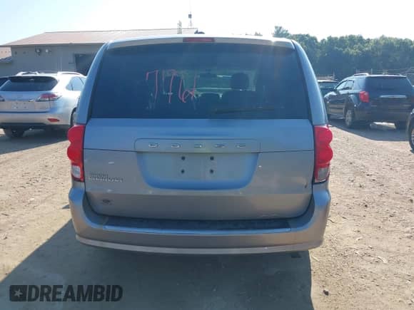 2014 Dodge Grand Caravan SE z VIN 2C4RDGBG6ER362491, wystawiony jako IAAI lot #42977761 z przebiegiem 240 771 mil mil oraz . Historia ofert i sprzedaży dostępna na DreamBid. Obrazek 17.