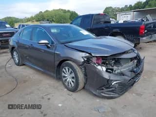 2021 Toyota Camry Hybrid LE with VIN 4T1H31AK0MU553127, listed as a IAAI auction lot 43099811 with 27,442 mi miles and . Bid and sale history available at DreamBid. Image 1.