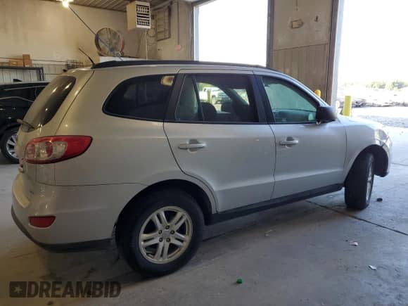 2012 Hyundai Santa Fe GLS с VIN 5XYZGDAB6CG165365, выставлен на аукционе Copart как лот 81910995 с пробегом 212 536 миль миль и Чистый • Clean title. История ставок и продаж доступна на DreamBid. Изображение 3.