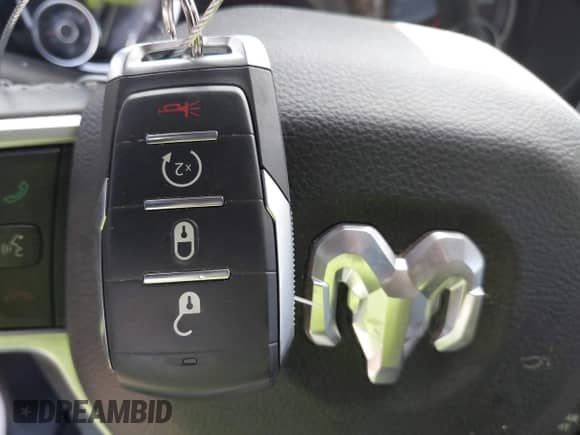 2022 Ram 1500 Big Horn z VIN 1C6RREBT8NN190343, wystawiony jako IAAI lot #42514747 z przebiegiem 65 593 mil mil oraz . Historia ofert i sprzedaży dostępna na DreamBid. Obrazek 11.