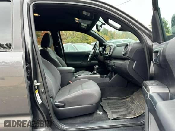 2017 Toyota Tacoma TRD Off Road z VIN 3TMDZ5BNXHM023386, wystawiony jako Copart lot #90888765 z przebiegiem 193 045 mil mil oraz Czysty tytuł • Clean title. Historia ofert i sprzedaży dostępna na DreamBid. Obrazek 6.