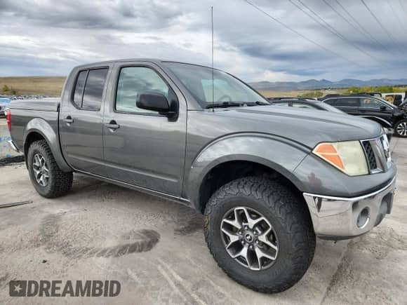 2005 Nissan Frontier SE with VIN 1N6AD07W35C419742, listed as a Copart auction lot 86340455 with 224,559 mi miles and Clean title. Bid and sale history available at DreamBid. Image 4.