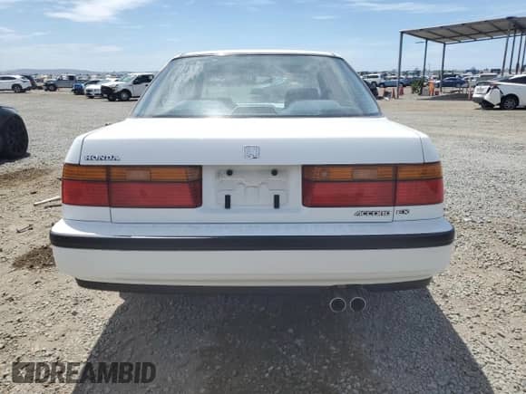 1991 Honda Accord with VIN JHMCB7664MC081955, listed as a Copart auction lot 69637115 with 169,851 mi miles and Salvage title. Bid and sale history available at DreamBid. Image 6.