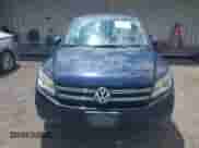2013 Volkswagen Tiguan SE z VIN WVGAV3AX1DW560501, wystawiony jako IAAI lot #42287579 z przebiegiem 180 367 mil mil oraz . Historia ofert i sprzedaży dostępna na DreamBid. Obrazek 6.