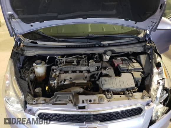 2014 Chevrolet Spark LT z VIN KL8CC6S92EC457667, wystawiony jako Copart lot #56103704 z przebiegiem 69 773 mil mil oraz Szkoda całkowita • Salvage title. Historia ofert i sprzedaży dostępna na DreamBid. Obrazek 11.