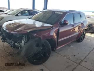 2016 Jeep Grand Cherokee Overland with VIN 1C4RJFCG8GC316318, listed as a Copart auction lot 67235395 with 73,588 mi miles and Salvage title. Bid and sale history available at DreamBid. Image 1.