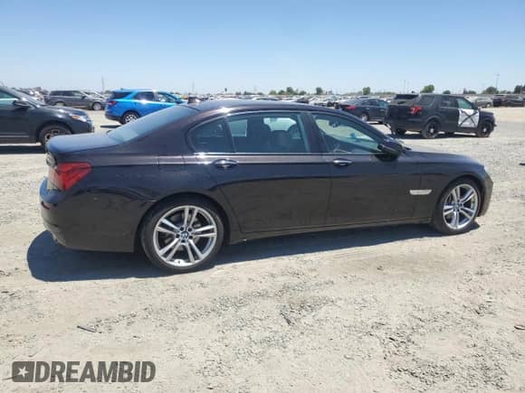 2014 BMW 7 Series 740Li with VIN WBAYE4C58ED137901, listed as a Copart auction lot 61493495 with 206,313 mi miles and Salvage title. Bid and sale history available at DreamBid. Image 3.