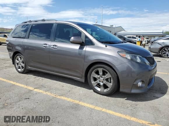 2013 Toyota Sienna SE with VIN 5TDXK3DCXDS347384, listed as a Copart auction lot 70305815 with 94,648 mi miles and Salvage title. Bid and sale history available at DreamBid. Image 4.