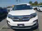 2020 Honda Pilot EX z VIN 5FNYF5H3XLB025409, wystawiony jako IAAI lot #42944660 z przebiegiem 78 876 mil mil oraz . Historia ofert i sprzedaży dostępna na DreamBid. Obrazek 12.