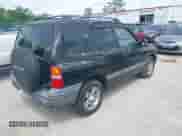 2003 Chevrolet Tracker z VIN 2CNBE13C036934432, wystawiony jako IAAI lot #42534682 z przebiegiem 91 245 mil mil oraz . Historia ofert i sprzedaży dostępna na DreamBid. Obrazek 4.
