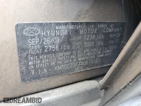 2004 Hyundai Santa Fe GLS z VIN KM8SC73E44U614043, wystawiony jako Copart lot #70482275 z przebiegiem 156 028 mil mil oraz Szkoda całkowita • Salvage title. Historia ofert i sprzedaży dostępna na DreamBid. Obrazek 13.