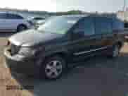 2009 Dodge Grand Caravan SXT with VIN 2D8HN54179R658097, listed as a Copart auction lot 66371205 with 254,202 mi miles and Salvage title. Bid and sale history available at DreamBid. Image 1.