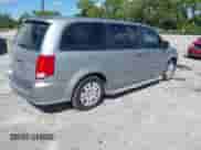 2014 Dodge Grand Caravan SE with VIN 2C4RDGBG1ER222834, listed as a IAAI auction lot 43446390 with 61,337 mi miles and . Bid and sale history available at DreamBid. Image 4.