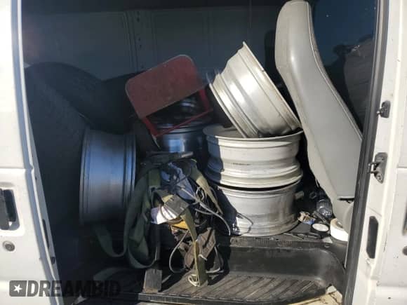 2003 Ford Econoline Cargo z VIN 1FTRE14213HB16422, wystawiony jako Copart lot #44203415 z przebiegiem 87 658 mil mil oraz Szkoda całkowita • Salvage title. Historia ofert i sprzedaży dostępna na DreamBid. Obrazek 11.