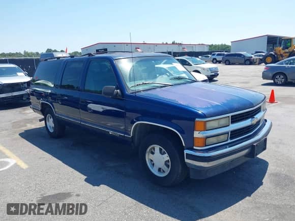 1997 Chevrolet Suburban z VIN 3GNEC16R8VG111155, wystawiony jako IAAI lot #42634153 z przebiegiem 282 812 mil mil oraz . Historia ofert i sprzedaży dostępna na DreamBid. Obrazek 1.