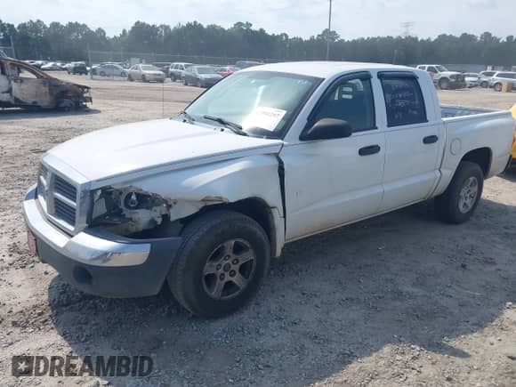 2005 Dodge Dakota SLT с VIN 1D7HE48KX5S244516, выставлен на аукционе IAAI как лот 42581297 с пробегом 247 599 миль миль и . История ставок и продаж доступна на DreamBid. Изображение 2.