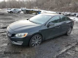 2014 Volvo S60 T6 with VIN YV1902FH9E2274593, listed as a Copart auction lot 43174135 with 84,645 mi miles and Salvage title. Bid and sale history available at DreamBid. Image 1.