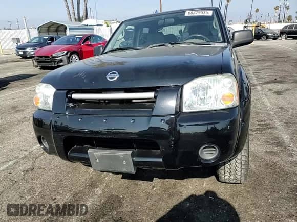 2004 Nissan Frontier XE with VIN 1N6ED27T64C477426, listed as a Copart auction lot 68329535 with 132,259 mi miles and Salvage title. Bid and sale history available at DreamBid. Image 13.