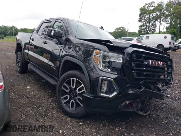 2021 GMC Sierra 1500 AT4 with VIN 1GTP9EELXMZ178245, listed as a IAAI auction lot 42707693 with 74,078 mi miles and . Bid and sale history available at DreamBid. Image 1.