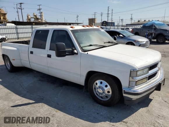 1999 Chevrolet Silverado 3500 with VIN 1GCHC33J7XF024092, listed as a Copart auction lot 64849475 with 188,547 mi miles and Non repairable. Bid and sale history available at DreamBid. Image 4.
