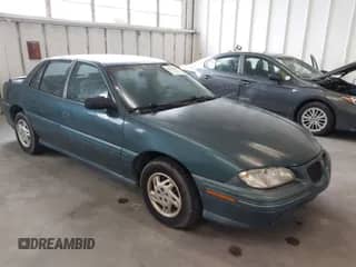 1998 Pontiac Grand Am SE z VIN 1G2NE52T1WC768383, wystawiony jako IAAI lot #42220195 z przebiegiem 275 908 mil mil oraz . Historia ofert i sprzedaży dostępna na DreamBid. Obrazek 1.
