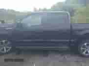 2019 Ford F-150 XL with VIN 1FTEW1E54KFB76726, listed as a IAAI auction lot 42970886 with 128,574 mi miles and . Bid and sale history available at DreamBid. Image 14.